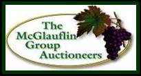 The LOGO for McGlauflin Group Auctioneers is Grapes on the vine.